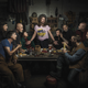 Illustration for article titled Mechanics Reenact Renaissance Paintings; Beautiful And Hilarious